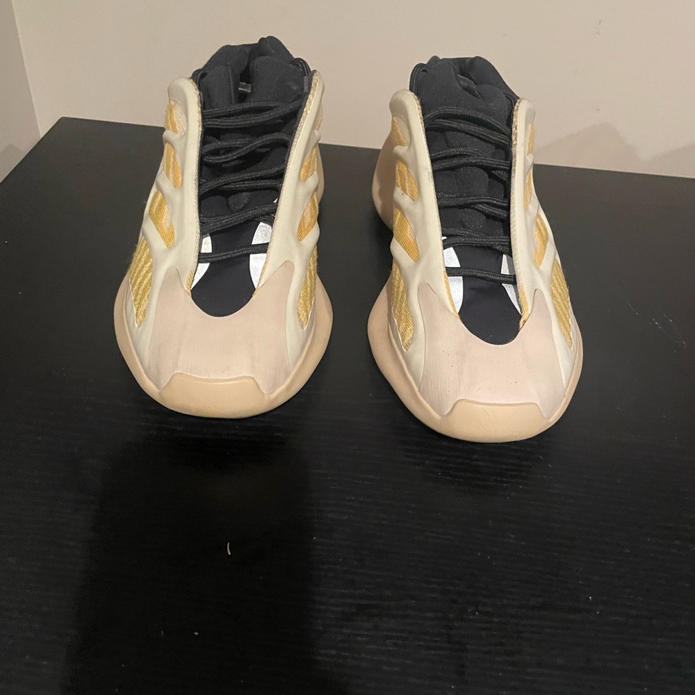 Yeezy Black and Cream Sneakers with Yellow Accents